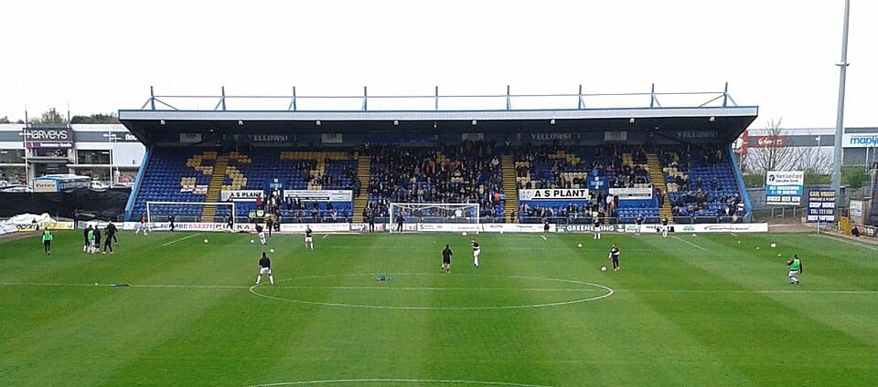 a picture of Field Mill, currently the One Call Stadium, has hosted football since 1861, with some accounts pushing it back as far as 1850.